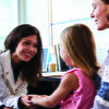 Doctor speaking with a little girl