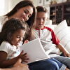Family Having a Great Time Together With Book