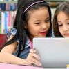 Girls watching a tablet